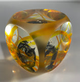 Klubo yellow swirls with black sphere